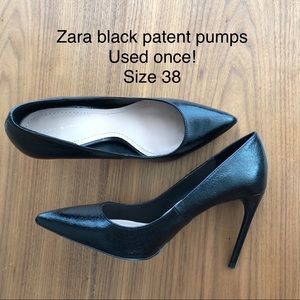Black patent pointy pumps